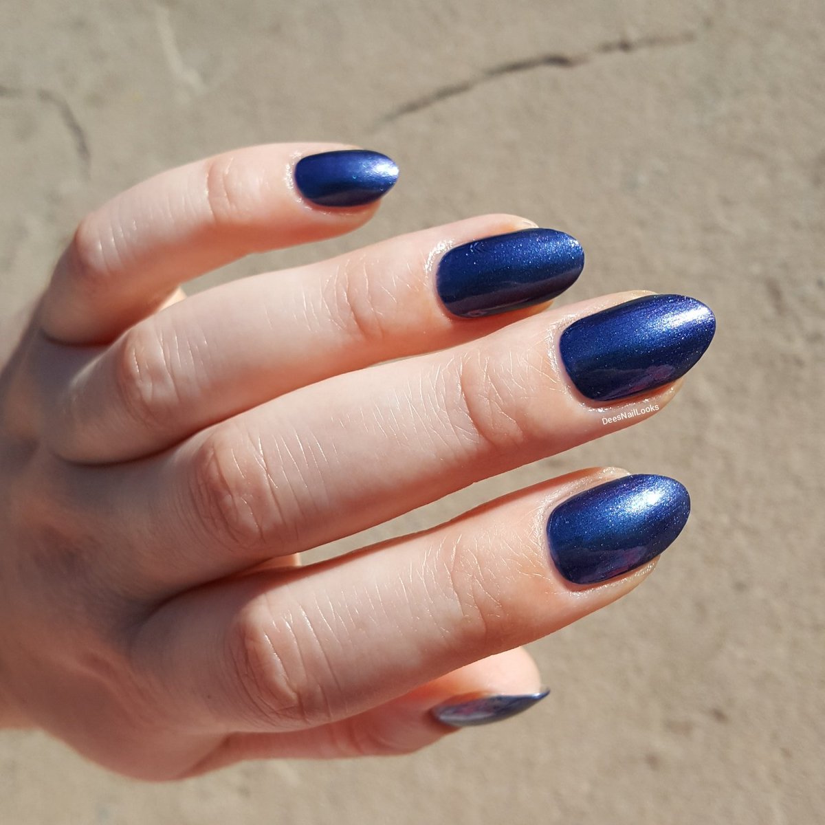 DeesLooks's tweet photo. Larissa (polish.lab.rat on Insta) suggested a nail colour of the week, this week it's navy so I #swatched this Essence Out of Space Stories multichrome (again lol). What navy polishes do you like to wear? https://t.co/B8OBhr7HDJ