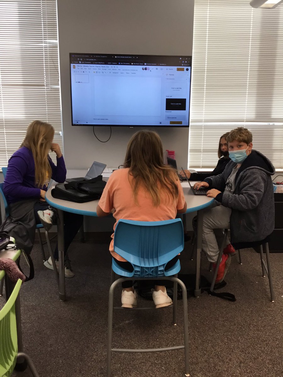 CIn the stem lab with 7th grade learning about biomes and coding.