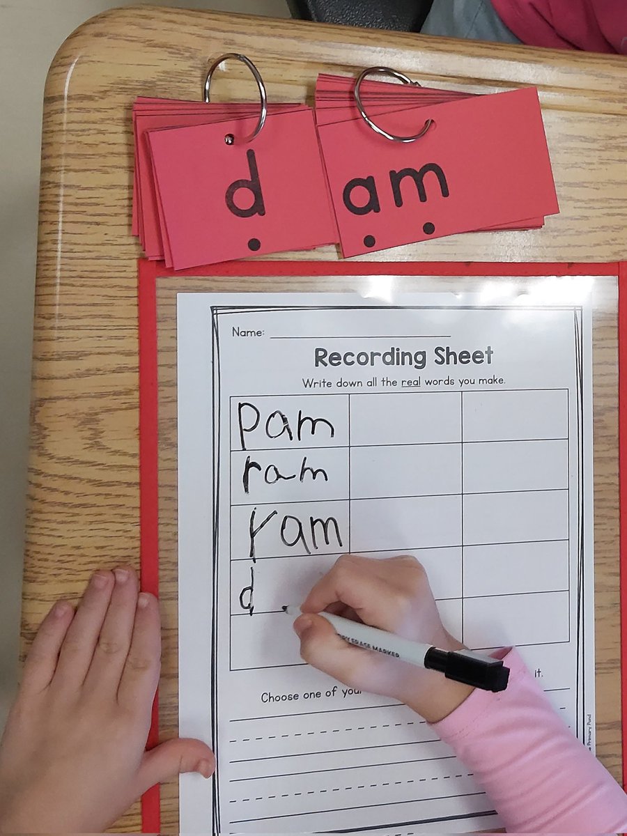 Msloncke's tweet photo. Students using word rings to find real words and writing them down. Batoul is proud that she filled all of the boxes and wrote a sentence using one. @BegleyBroncos1 https://t.co/ZH1QYhXw0a