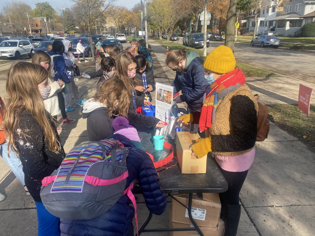 ⁦<a href="/oakparklibrary/">@oakparklibrary</a>⁩ visited today engaging our students about John Lewis,   &amp; their peace circles around the March trilogy. Students entered a raffle to win a March boxed set  &amp; made buttons honoring his “good trouble. #weared97 #bebrooks97