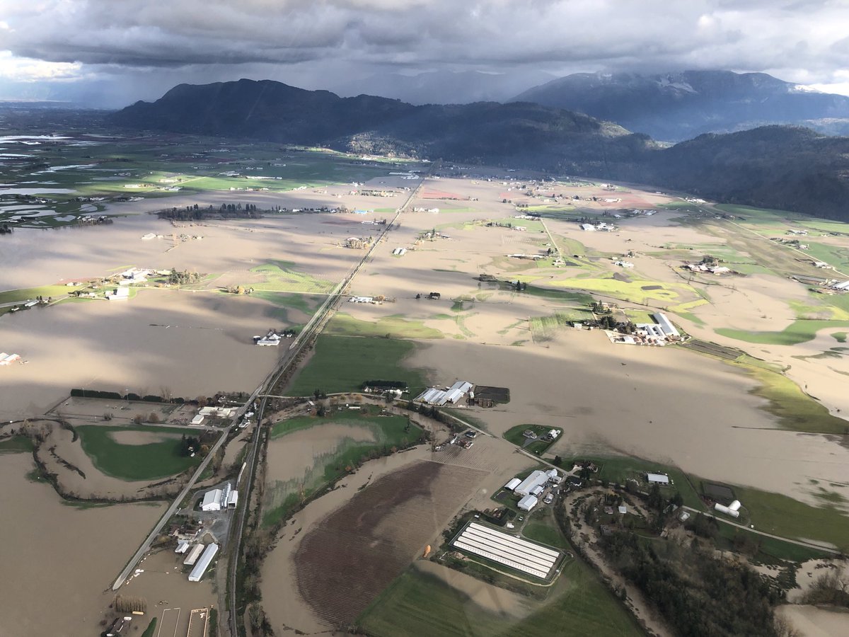 ianhanomansing's tweet photo. The view just east of Abbotsford. Even in a flood prone region our chopper pilot says he’s never seen anything close to this here. More to come on The National. https://t.co/HQfYzaFQck