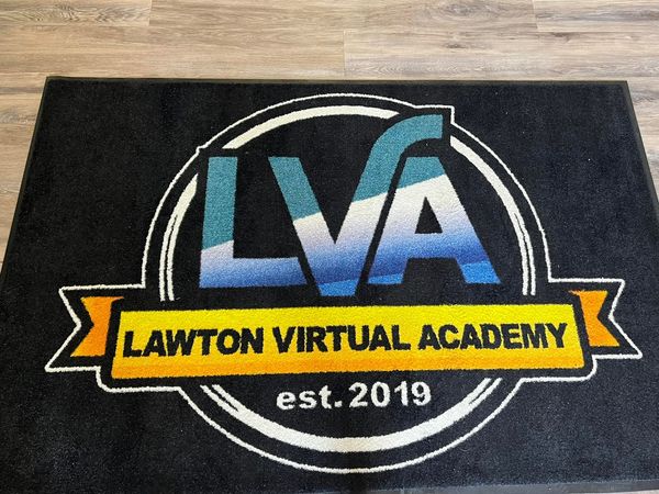 LawtonPS's tweet photo. Lawton Virtual Academy is so excited about their new indoor and outdoor rugs to brighten up the building and add some curb appeal. Thank you to LPS and Dr. Jason James for making this happen. #LawtonPS #WeAreLPS #lpsnextlevel https://t.co/LjzZ0B7tNh