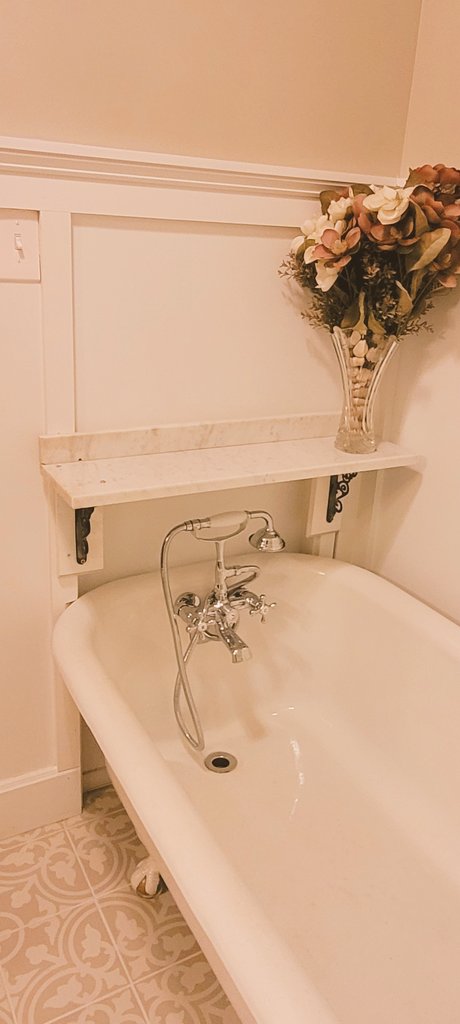 Finally got the last peice of the bathroom remodel done! A marble shelf above the wife's fancy tub. Shhhh... No one tell her the marble if from behind the urinals of an old hotel.