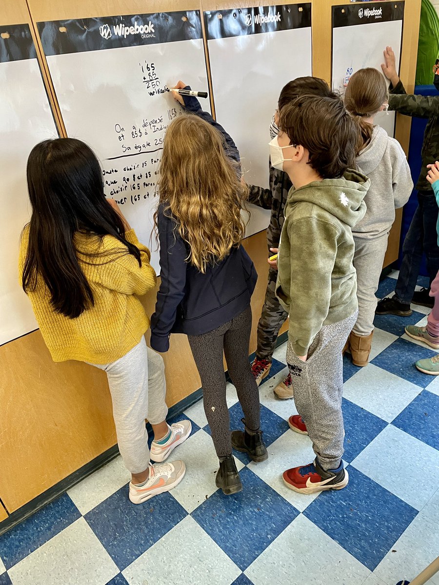 214Frimm's tweet photo. Students making use of our vertical spaces to work on math problems today. We are helping each other find ways to show our thinking clearly. #ThisIsMath @AllenbyPS_TDSB @Wipebook https://t.co/4ziHIRSXSM