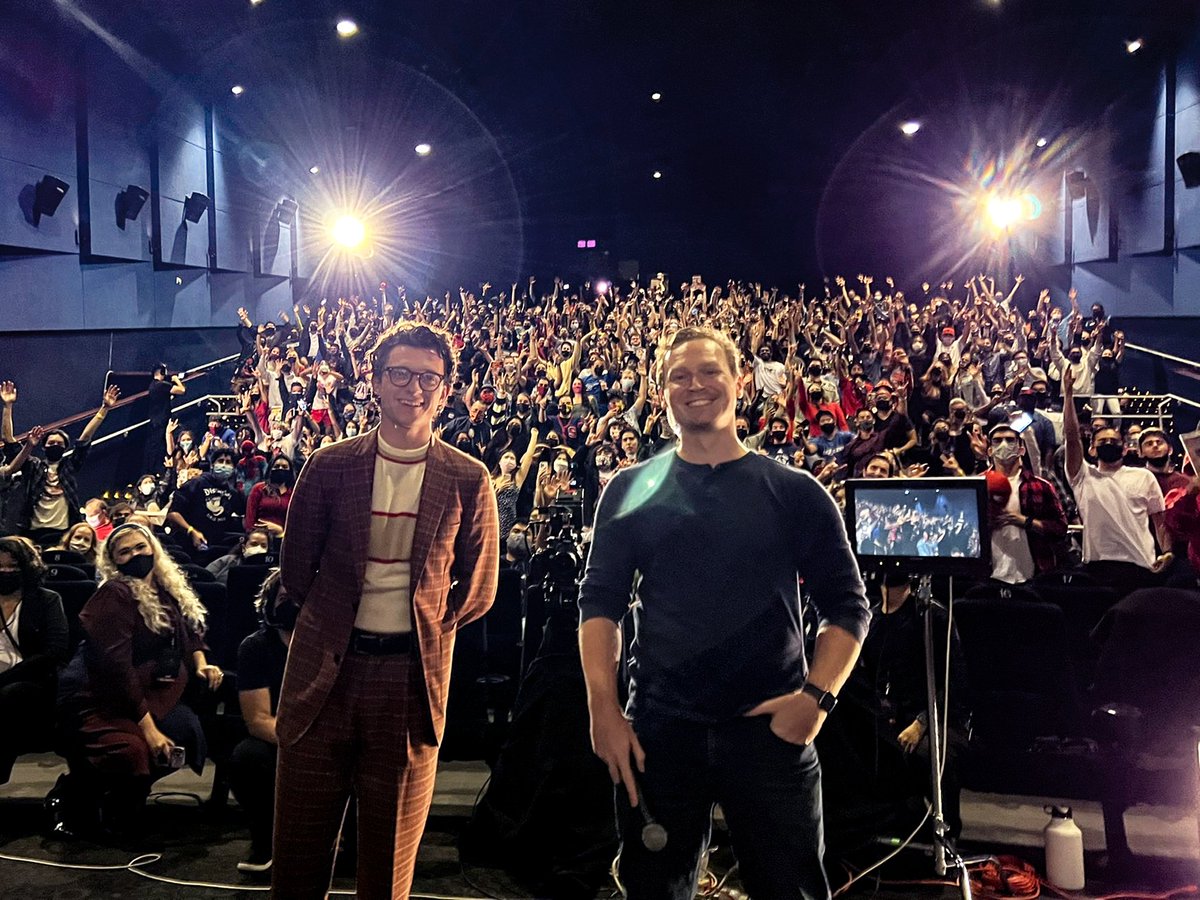 MovieWire's tweet image. #TomHolland joined fans at tonight's #SpiderManNoWayHome's trailer launch event!

What are your #NoWayHome trailer theories?