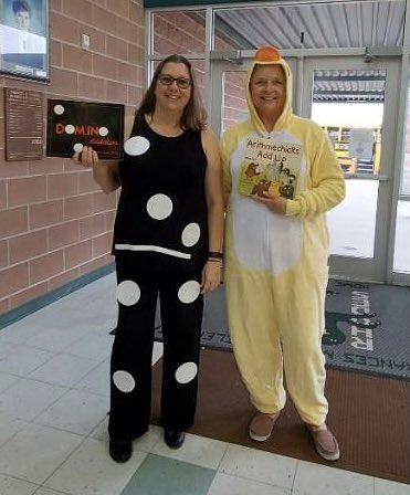 MsSFlinn's tweet image. How do the math teachers rock the book character parade? Well, with Math books of course! #DominoAddition #ArithmechicksAddUp @TeamHelgeson @NISDRhodes