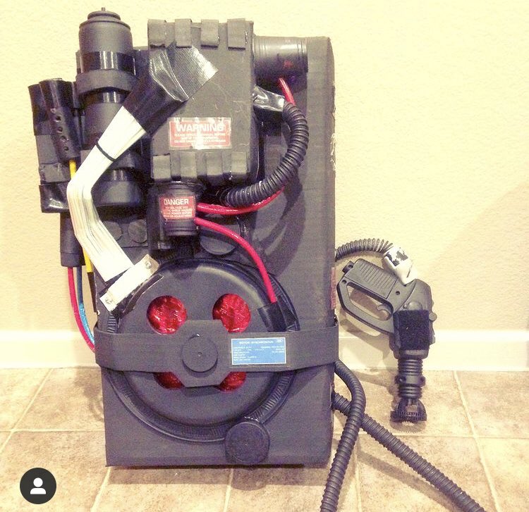 Anchoredcloud's tweet photo. Hoping to snag some of that Ecto-cooler for those @Ghostbusters fanatic children of mine.  Hopefully we get slimed by 💚 @DrinkHiC @Ghostbusters here are some photos from a few years ago!  I made that proton pack from a diaper box and other scraps! https://t.co/7LaeRVNJOv
