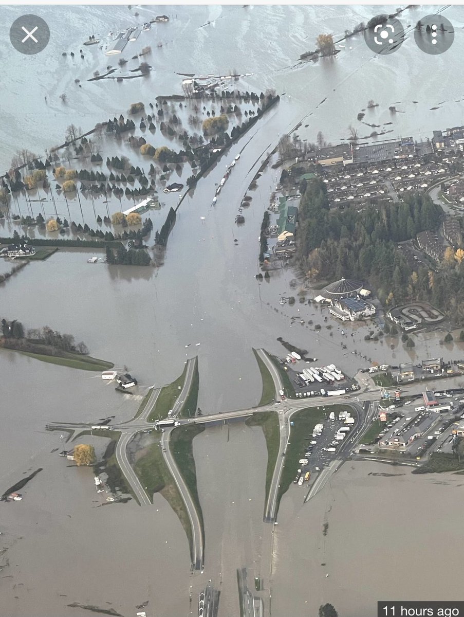 mackenz_kitchen's tweet photo. This is my home town. In between those 2 overpasses is the TransCanada hwy. This area may be under a lot more water soon, as the pumps holding the Fraser back are failing. I have no words, the loss is too incalculable 😔 https://t.co/xZ9pD26vaS