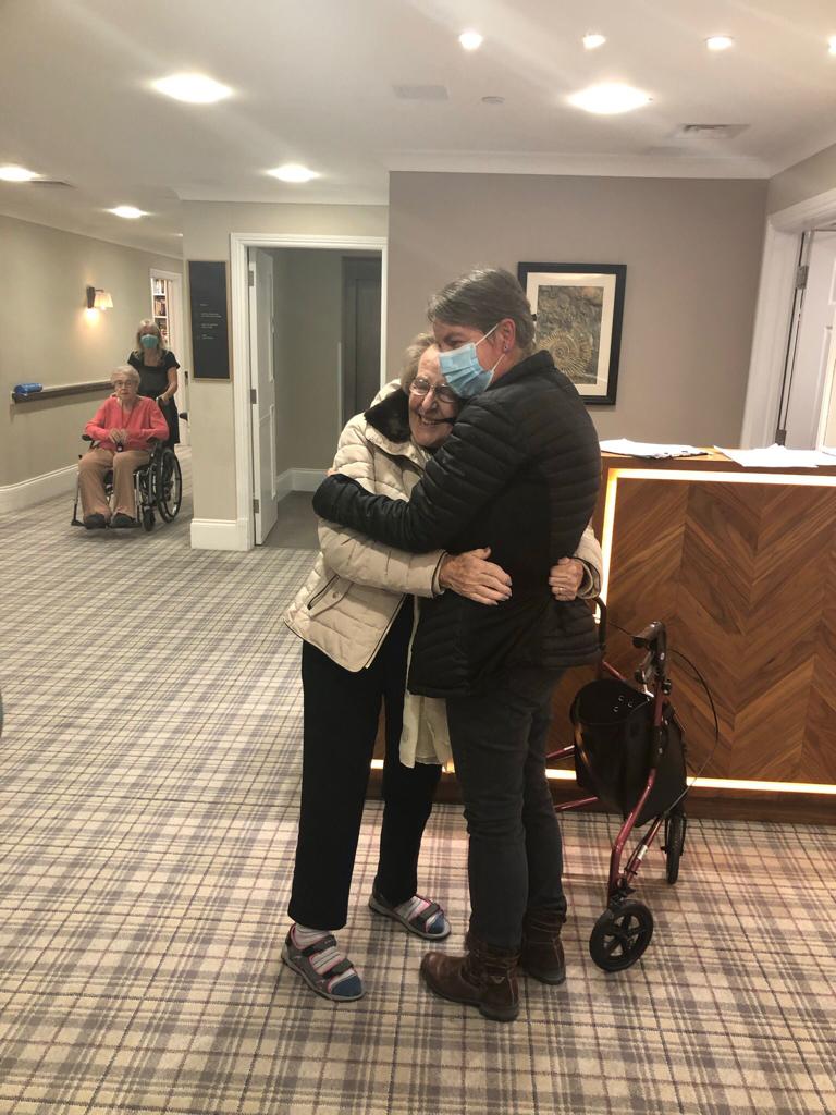 PineMartinCare's tweet photo. What a moving surprise this week for Annette as she is reunited with her daughter after two years! Her daughter has been living in America and has been unable to come to the UK. It's lovely to see families re-united! ❤️ https://t.co/STSNJlYgpu