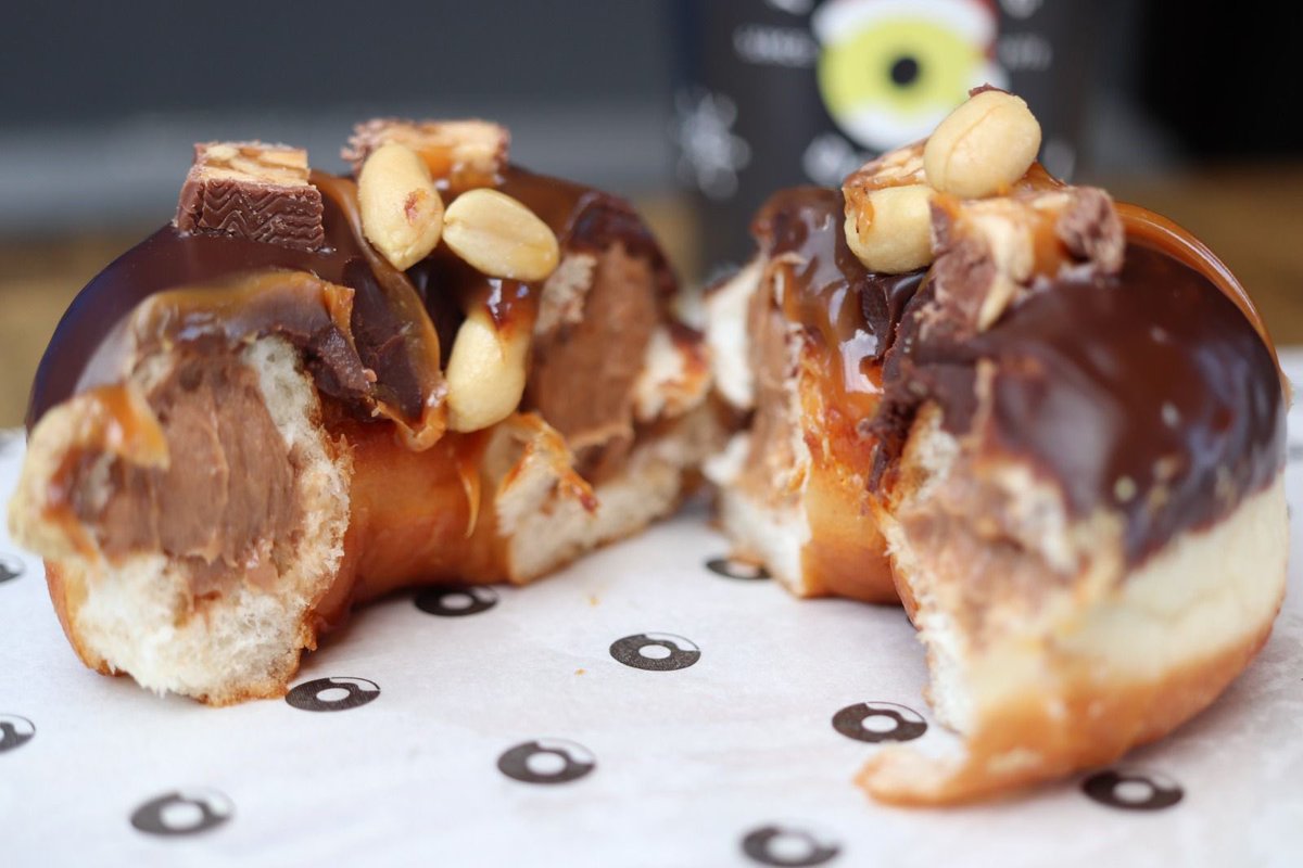Introducing our NEW SNICKERS® Donut! 🍩 Out TODAY in all stores! 

Classic Sourdough Ring Donut filled with creamy caramel and peanut filling, topped with our signature chocolate ganache, caramel drizzle, peanut and SNICKERS® pieces.

#newflavouralert