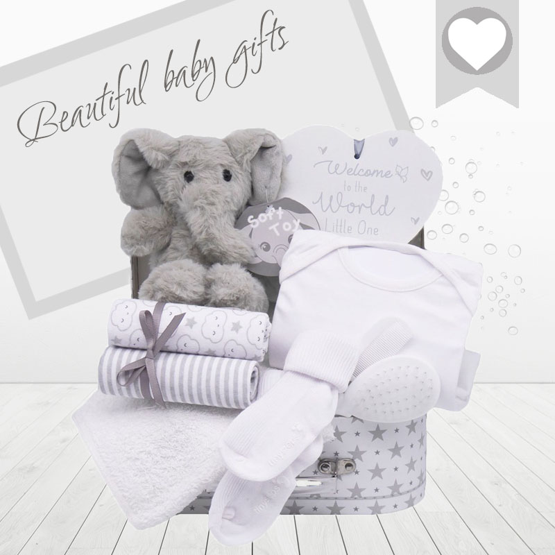 Send your congratulations with this beautiful neutral suitcase baby hamper. It would make a lovely first baby gift for parents, maternity leave, new arrival or a centrepiece at an elephant themed baby shower. pitterpatterbabygifts.co.uk