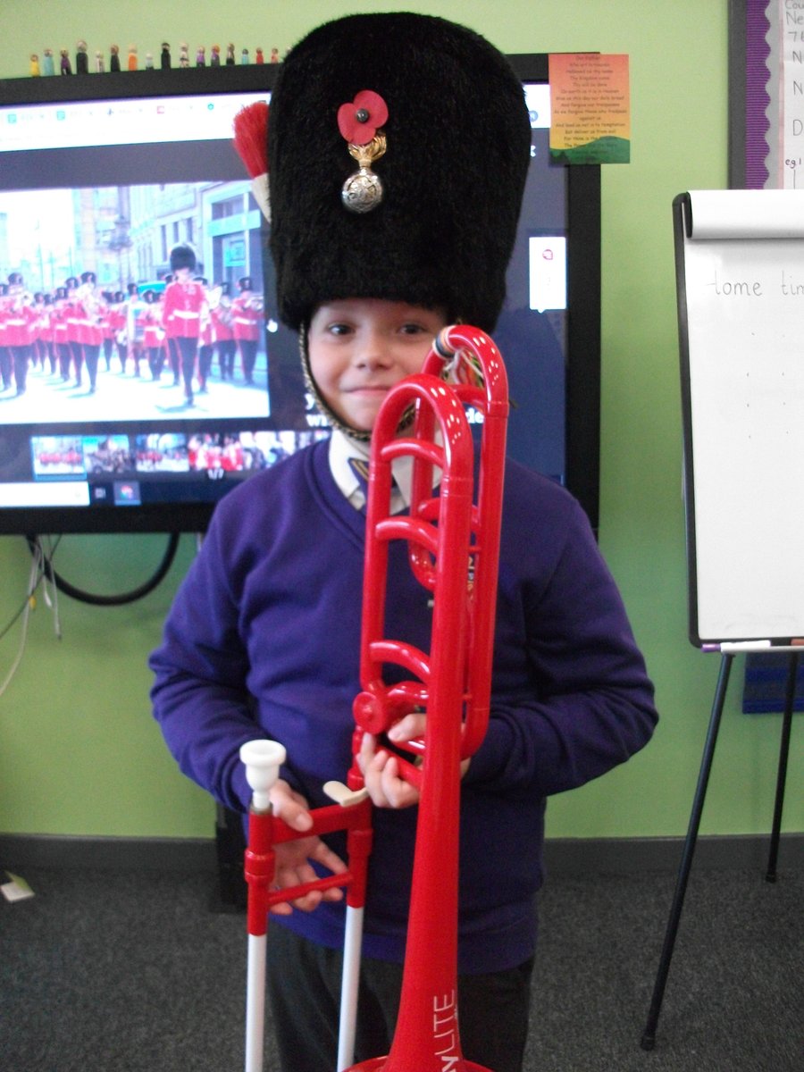NCEAMusic's tweet photo. Brass pupils at Grace Darling have been learning about the importance of music over Remembrance weekend. Some even tried on a ceremonial hat from the Band of the Royal Regiment of Fusiliers! #HowSmart #ProudTeacher @NCEA_GD_Primary https://t.co/bs4Pv47Xeq