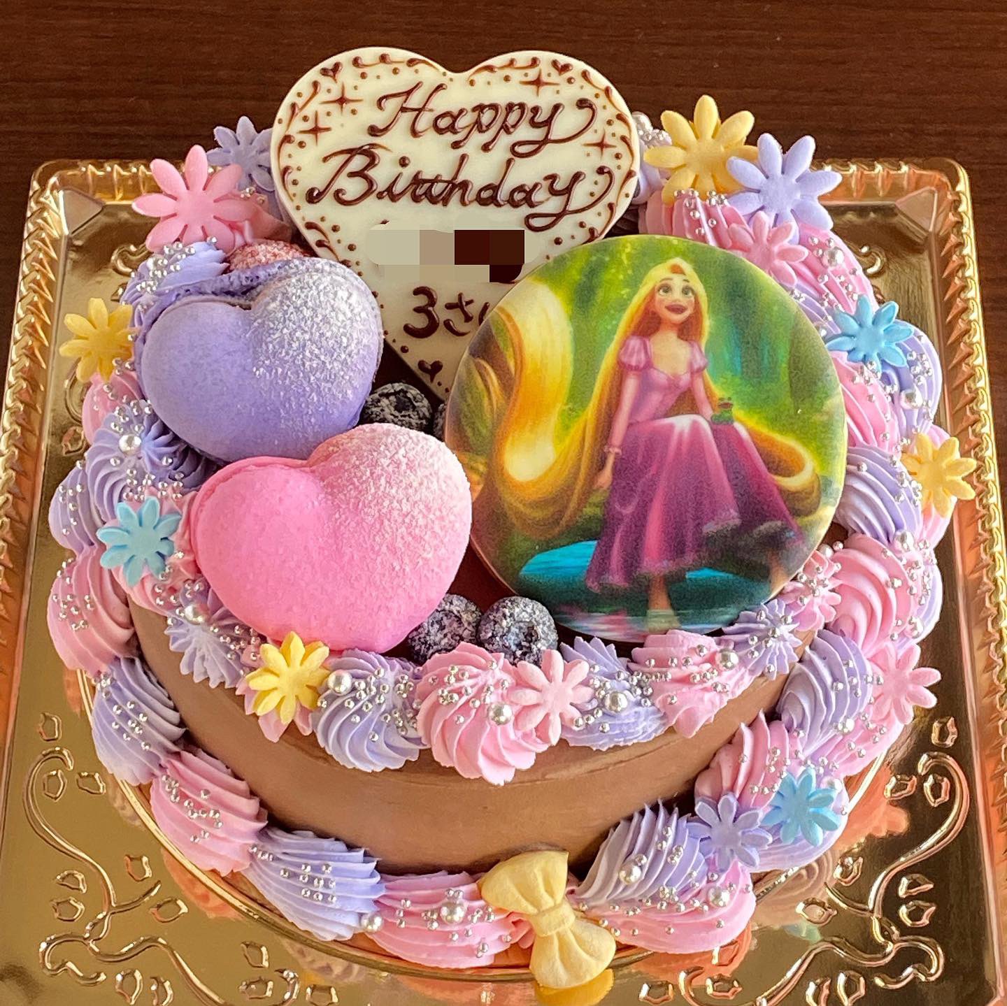 アレルギーっ子のミカタ ケーキ屋ローラ ずーっと前から 出来たらいいのにな って夢想してて でもずっと出来なかったデコ プリンター様のおかげで 遂に叶いました 三つ編みデコレーションに イラスト足しちゃいました ラプンツェル