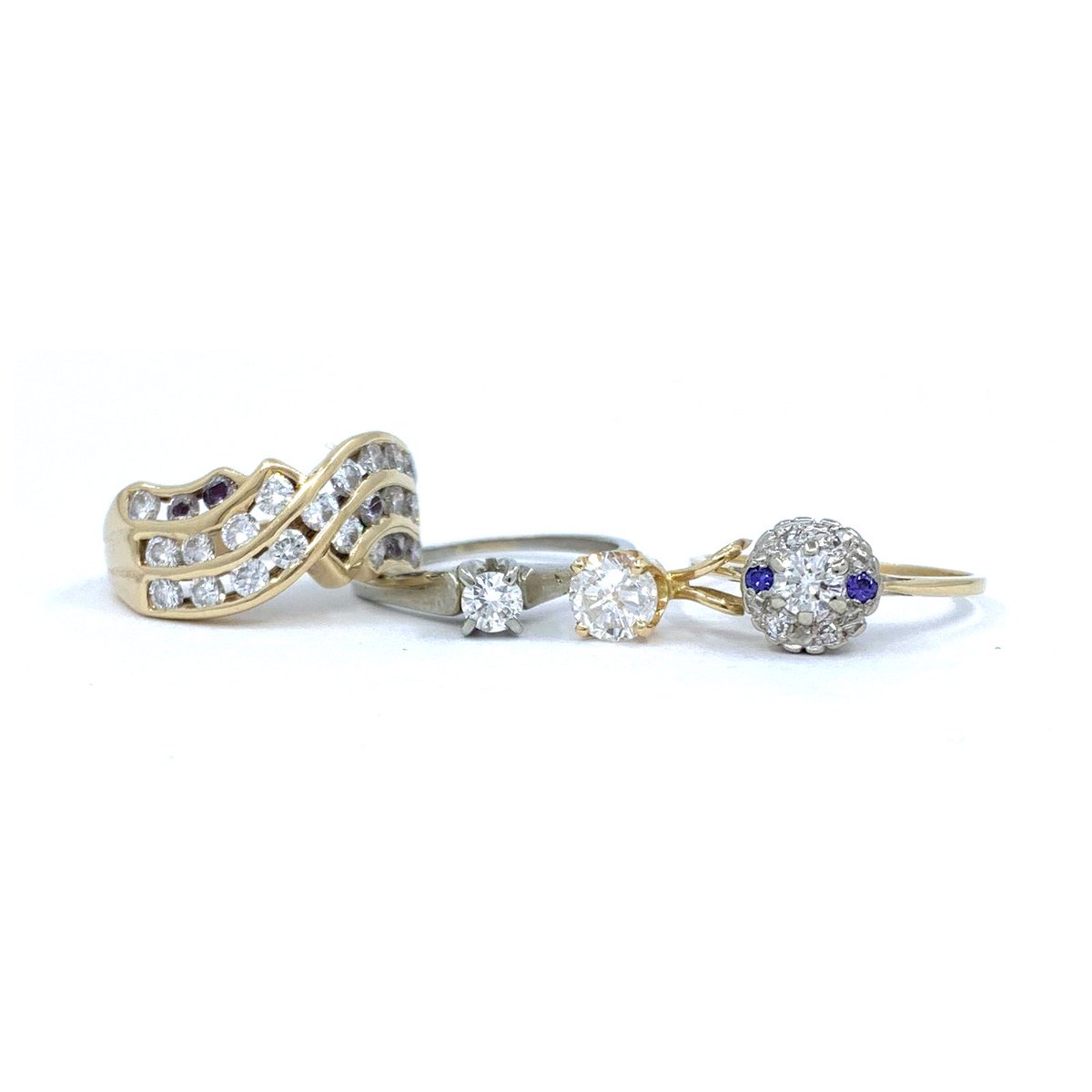 “This ring is inspired by both sentiment and legacy.”

 A combination of diamonds from hers and her mom’s rings as well as the actual cluster top of her aunt’s ring were used to create this beautiful band style ring set in yellow and white gold. Let us tell YOUR story.