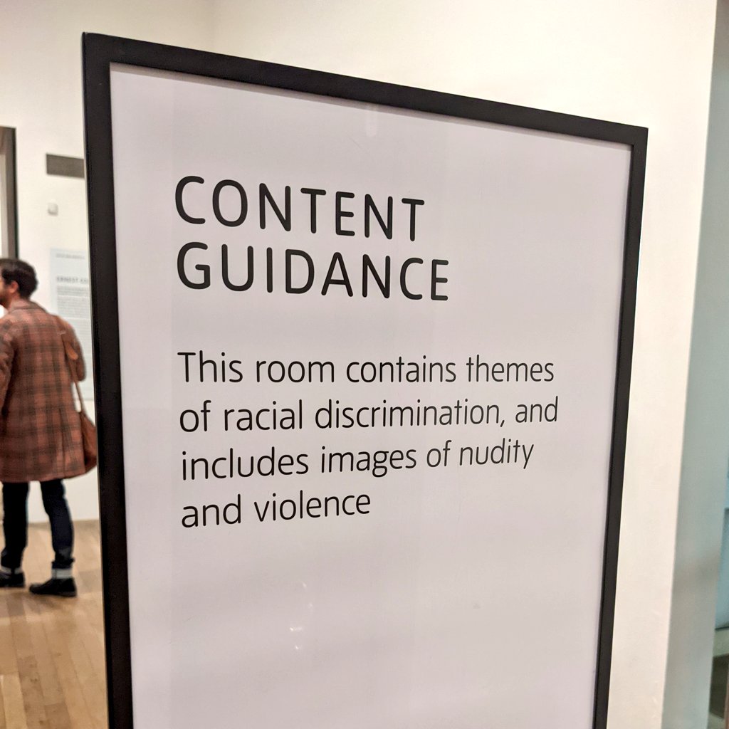 magmidd's tweet photo. Some nice examples of content warnings at @Tate Modern.

What's working: clear content description, no assumptions about visitors, prioritizes marginalized folks, not stigmatizing (nudity could be omitted)

Room to improve: alt route for those wanting to avoid the gallery https://t.co/EizTRL6DRf