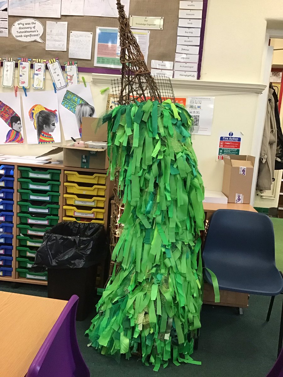 newton_class's tweet photo. We did some rag weaving in Amethyst class.... to make a Christmas tree that will be on display in our community over the festive season. https://t.co/Y8gg4bAO27