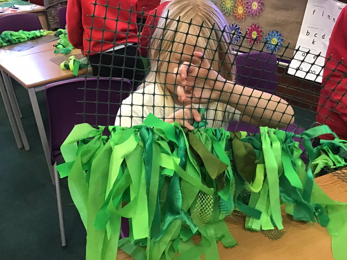 newton_class's tweet photo. We did some rag weaving in Amethyst class.... to make a Christmas tree that will be on display in our community over the festive season. https://t.co/Y8gg4bAO27