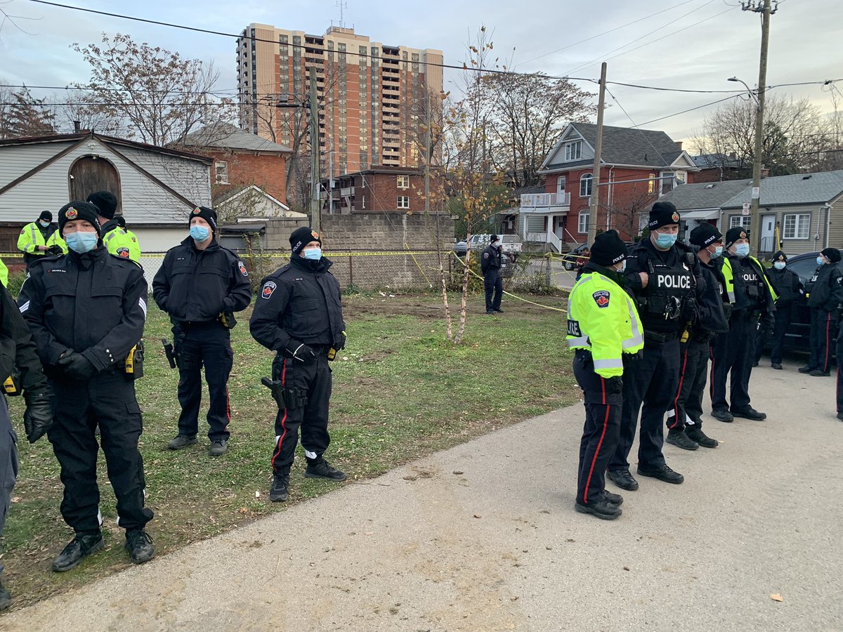 WillAllen2727's tweet photo. Massive police presence at an encampment eviction at JC Beemer Park. This resident is currently being forcibly displaced their home though they wish to stay. Hamiltonians - if you can, please come bear witness to this injustice. Food, blankets, and other material aid are welcomed https://t.co/FZHLKyorhl