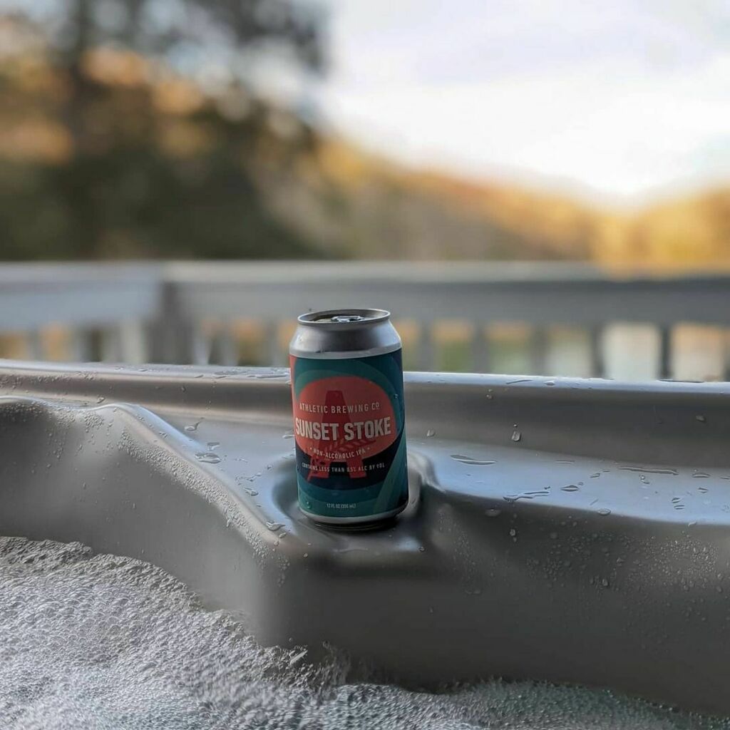 TimGrotenhuis's tweet photo. A snake! A lake! And fake! Chilling in the hot tub after a short run at Norris Lake with Athletic Brewing’s best NA IPA yet! #ashevilletrails #trailful #findyourdirt #Trailrunner #timetoplay #choosemountains #trailrace #trailrunnermag #trailrunningviews … https://t.co/Z5Ee0Lwzcu https://t.co/SOqTYvctRk