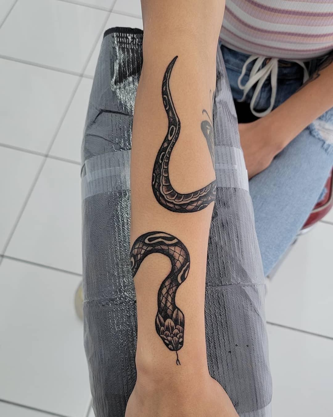 Share more than 67 snake on wrist tattoo super hot in.cdgdbentre