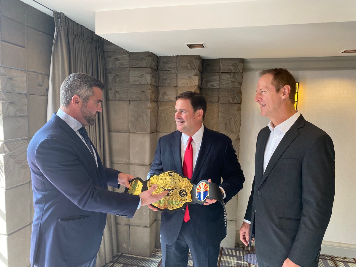 DougDucey's tweet photo. It was an honor to be presented with the first-ever @AFPhq Arizona Income Tax Championship belt. Thank you, @TimPhillipsAFP, for this recognition and for your long-standing partnership. Arizona is dedicated to being a national leader in tax reform. https://t.co/6w8Tq925mt
