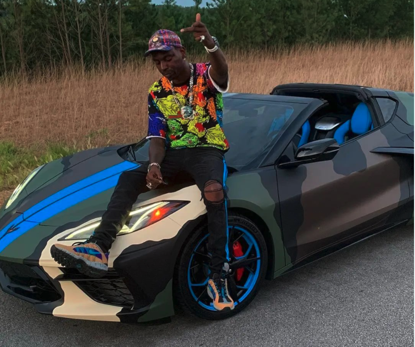 Its quite possible that Young Dolph was followed to the cookie shop since he was driving his infamous & very noticable camo vehicle or someone who noticed him in the shop may have tipped his killers off. He was standing in the store when a car pulled up firing through the window