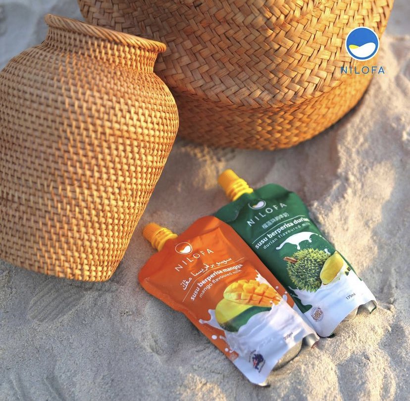 Neelofa's tweet photo. Here’s to another round of NILOFA Tropical Heat Beach. This time a dream vacation at Hard Rock Hotel in Penang is up for grabs! Just purchase the NILOFA Banana or Durian Flavoured Milk and stand a chance! #NILOFA https://t.co/HTh4i4WxUX