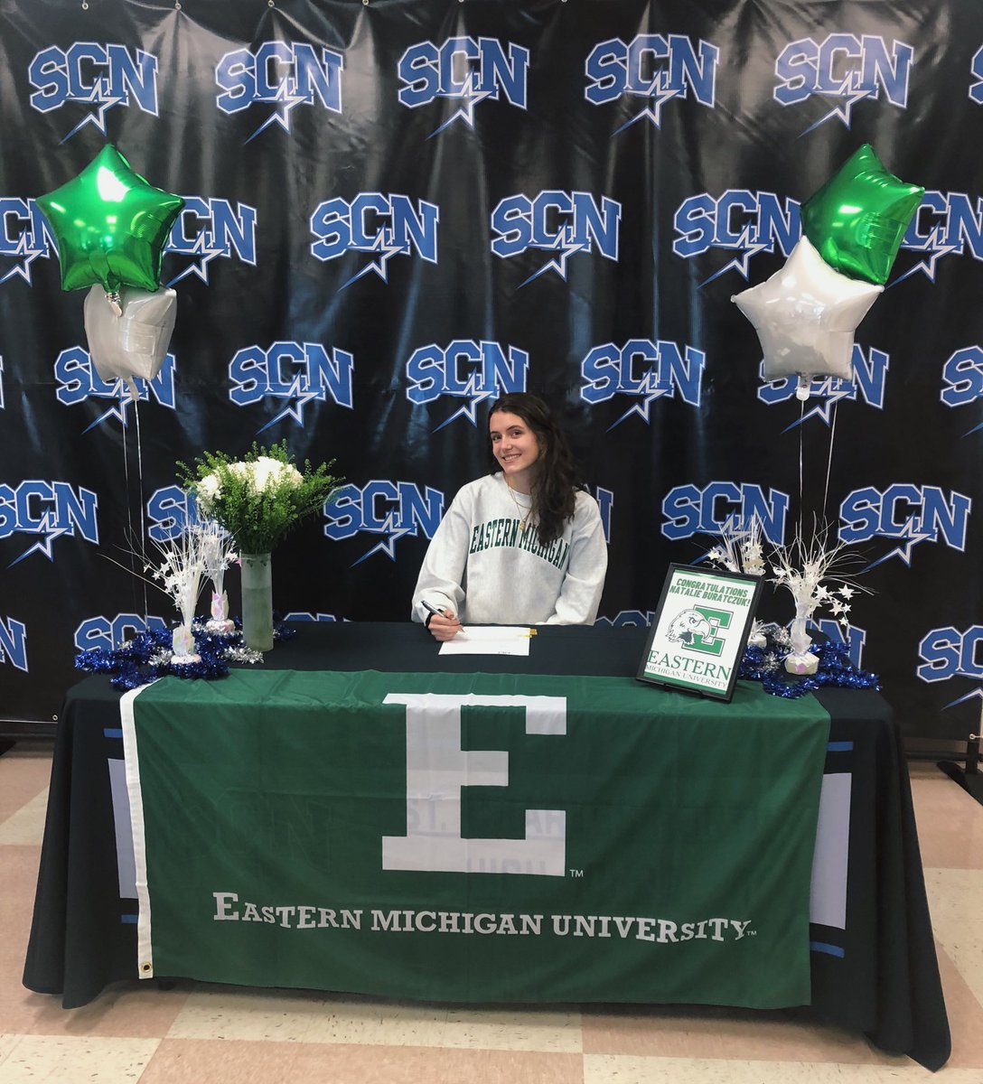 natburatczuk's tweet photo. Officially signed! Huge thank you to everyone who came to support me taking the next step yesterday. Can’t wait for my senior track season with my girls 💚🤍 https://t.co/zfH9KVKKw9