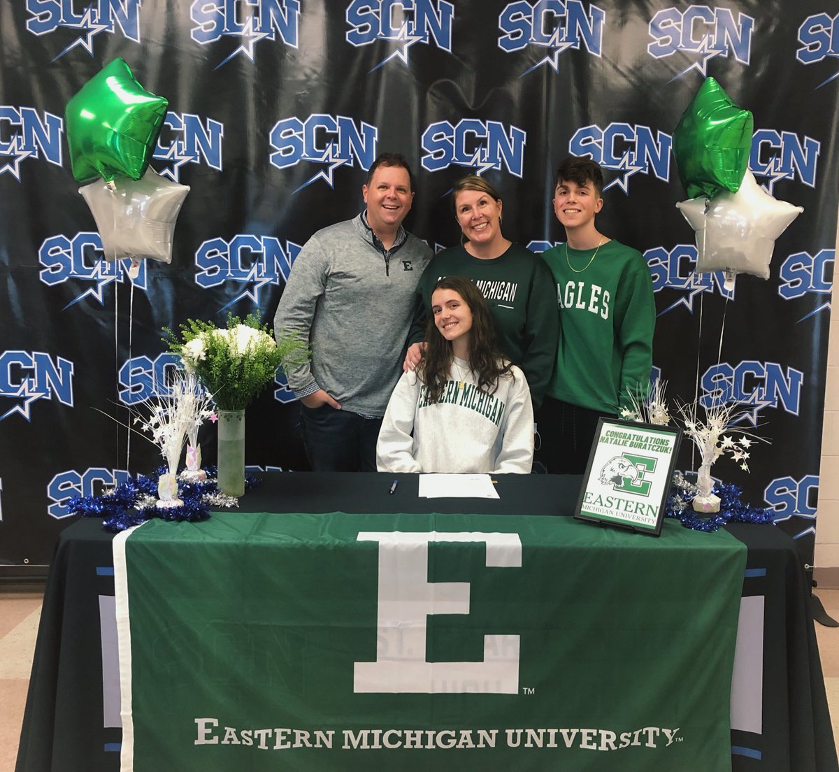 natburatczuk's tweet photo. Officially signed! Huge thank you to everyone who came to support me taking the next step yesterday. Can’t wait for my senior track season with my girls 💚🤍 https://t.co/zfH9KVKKw9