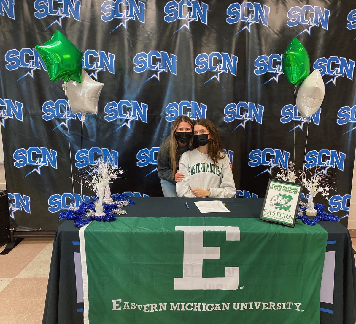 natburatczuk's tweet photo. Officially signed! Huge thank you to everyone who came to support me taking the next step yesterday. Can’t wait for my senior track season with my girls 💚🤍 https://t.co/zfH9KVKKw9