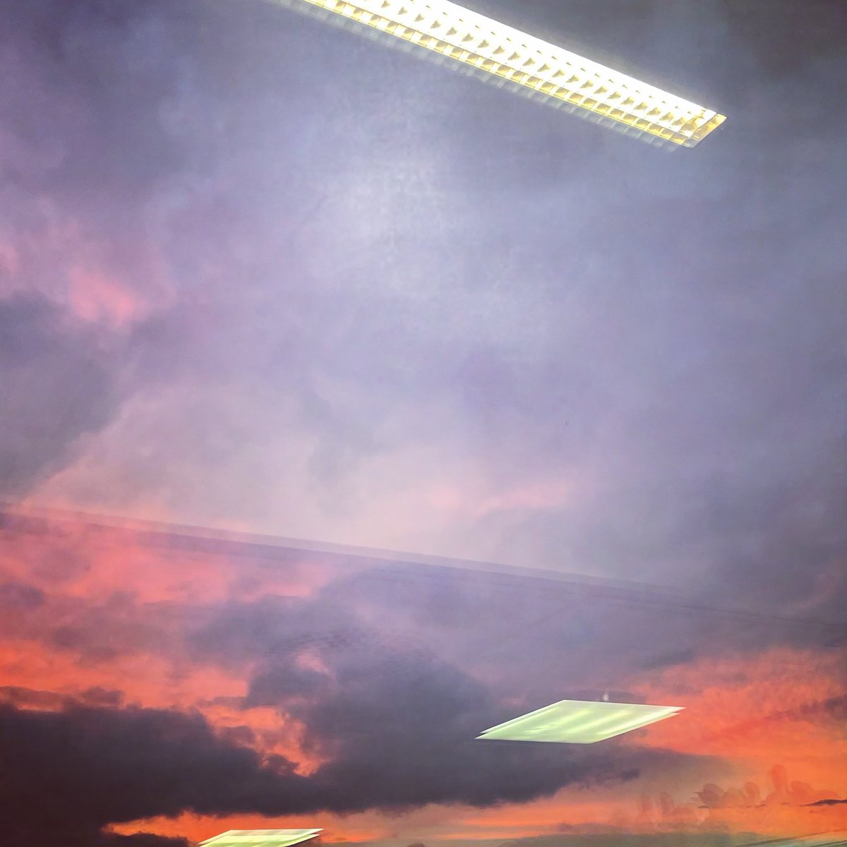 The beckoning sunset sky behind the reflected office lights.

How’s everything with you?