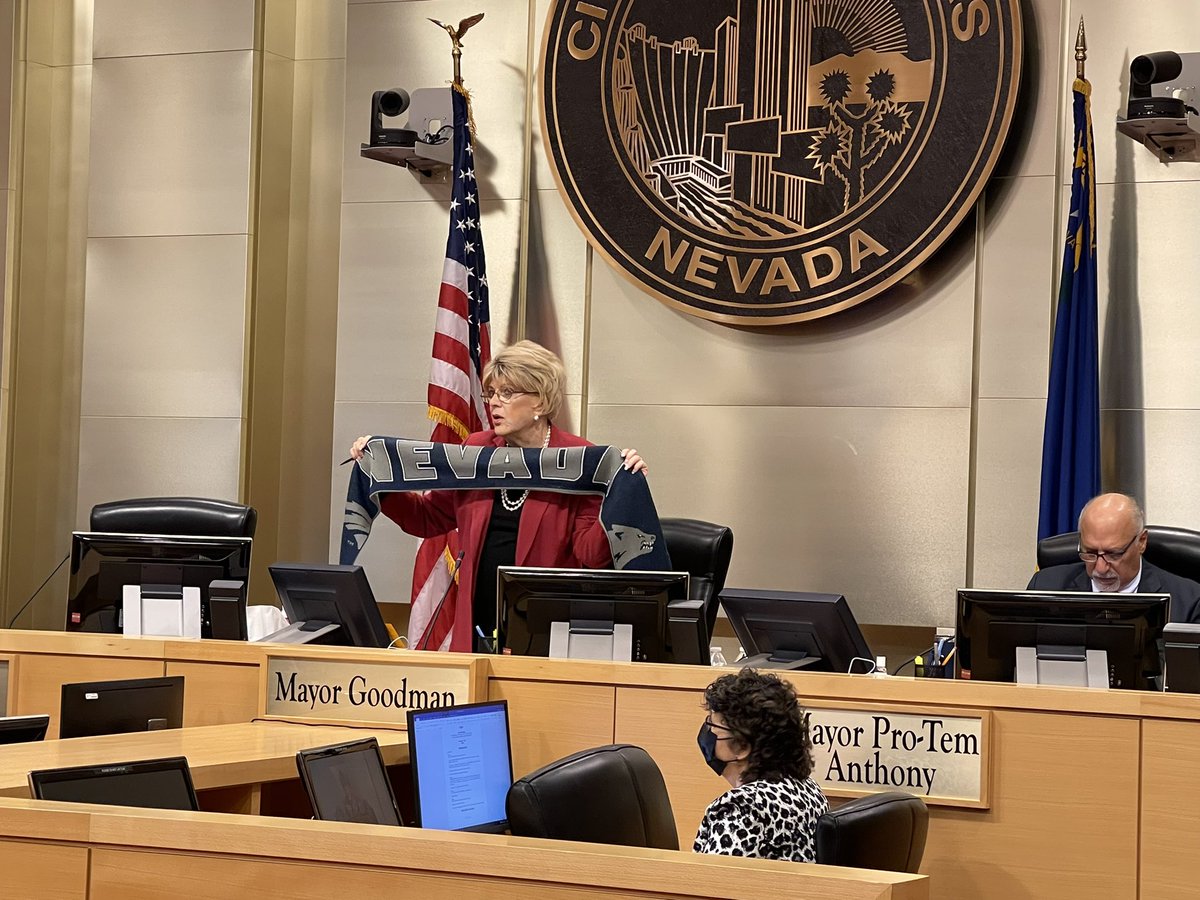 mayoroflasvegas's tweet photo. Congratulations to @MayorSchieve, @CityofReno & @NevadaFootball on retaining the Fremont Cannon. I am wearing a beautiful Wolf Pack scarf at the City Council meeting today to pay off our bet. We look forward to welcoming you all to Allegiant Stadium in 2022! https://t.co/rbji6MDNk0