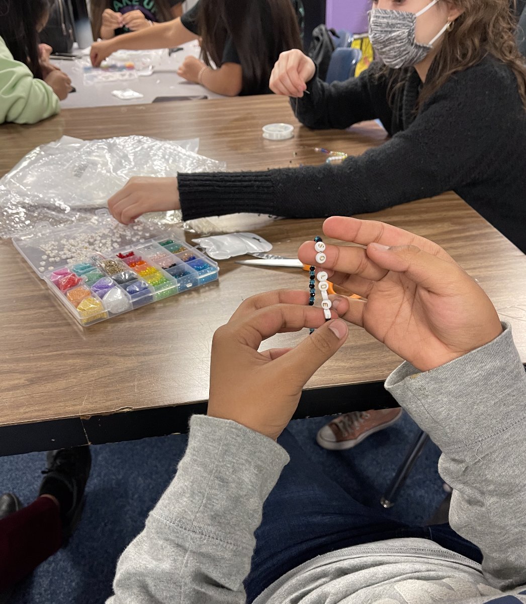 EstrellaCSD's tweet photo. The Estrella #WakeUpClub made friendship bracelets for troops overseas then went on a fun field trip to Main Event! #oneteamunafamilia https://t.co/wDdGs3r9KW