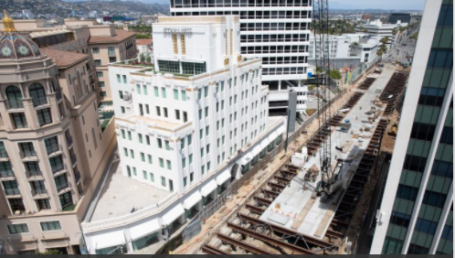 PurpleLineTBMs's tweet photo. TBMs on the Move! Pt.3: Both station boxes are constructed using the cut-and-cover method, as seen in this photo. The cut and cover method is a traditional form of tunneling that involves opening the ground surface and excavating to the required depth. #decking https://t.co/SMhhJq6T9A