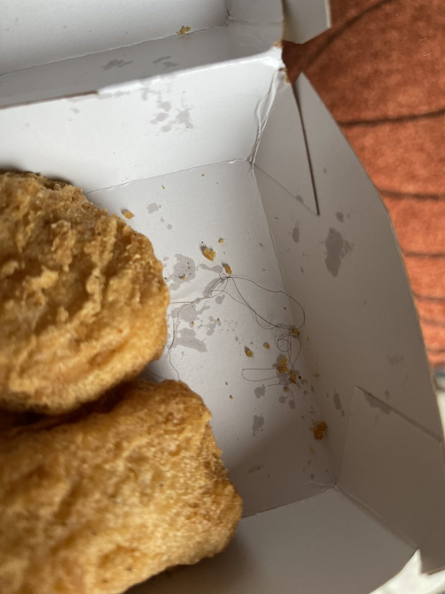 starlvs04's tweet photo. This is so disgusting and nauseating. Finding hair in the bottom of your McDonald’s chicken McNuggets makes me want to vomit. #gross #dobetter #McDonalds @McDonaldsCorp @McDonalds https://t.co/KZUnlVkXgu