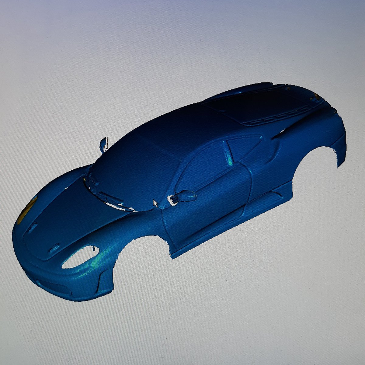 Make_It_RC's tweet photo. Body has been 3d scanned so I can model the wide body kit and rear wing. The 3d scan makes the design process much easier. #3dscanning #customrc https://t.co/w8NaCY2mdR