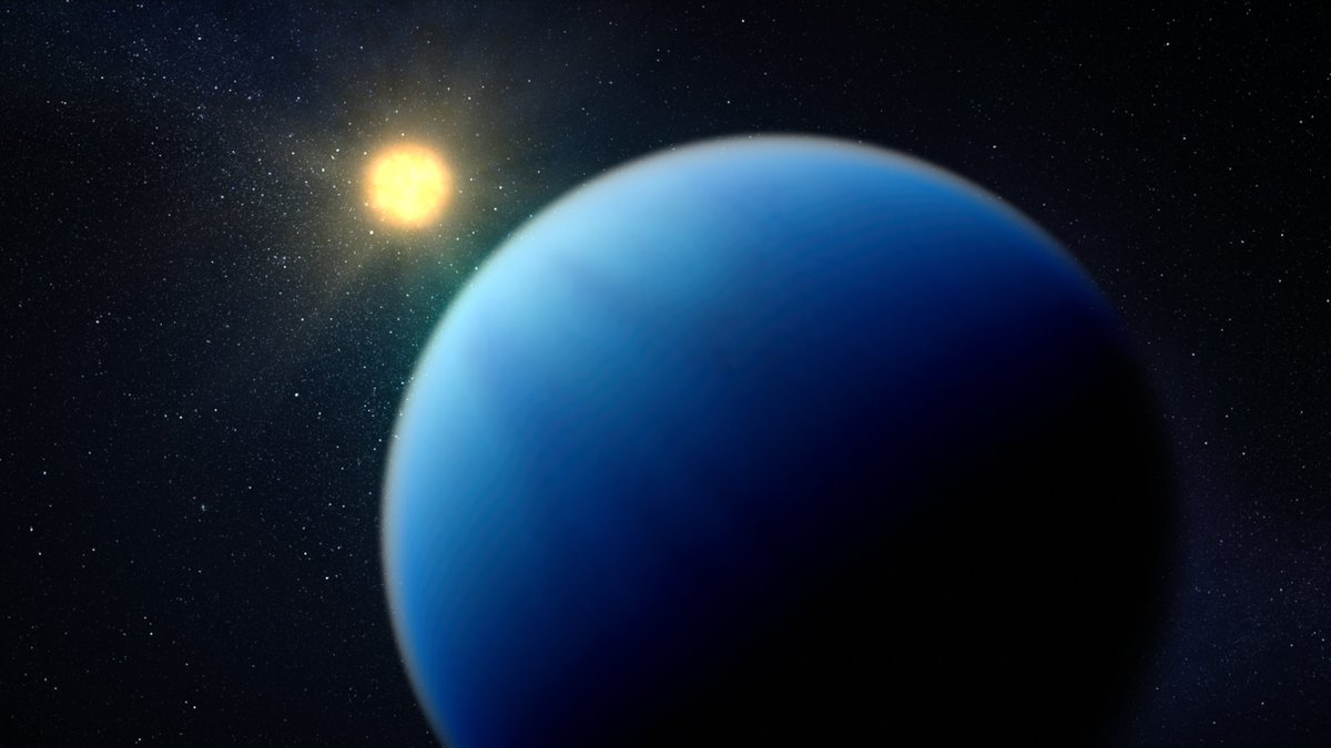Artist illustration of blue, cloudy sub-Neptune exoplanet around a yellow glowing star