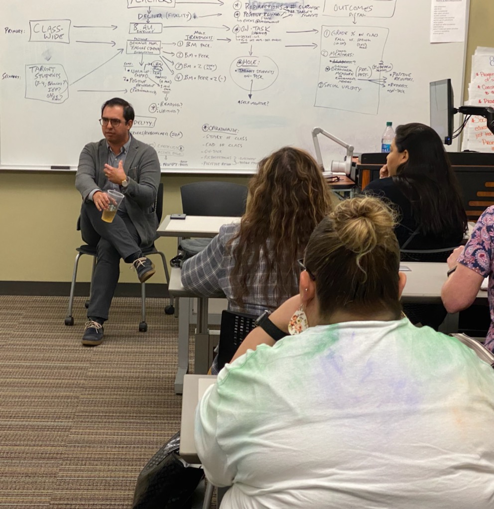 TAMUSACI's tweet photo. Education philosopher, poet, folk musician, &amp; professor, Dr. Sam Rocha presented to a packed house of C&amp;I graduate and undergraduate students tonight. Thank you for the engaging conversation! https://t.co/gXIbpu7KQk