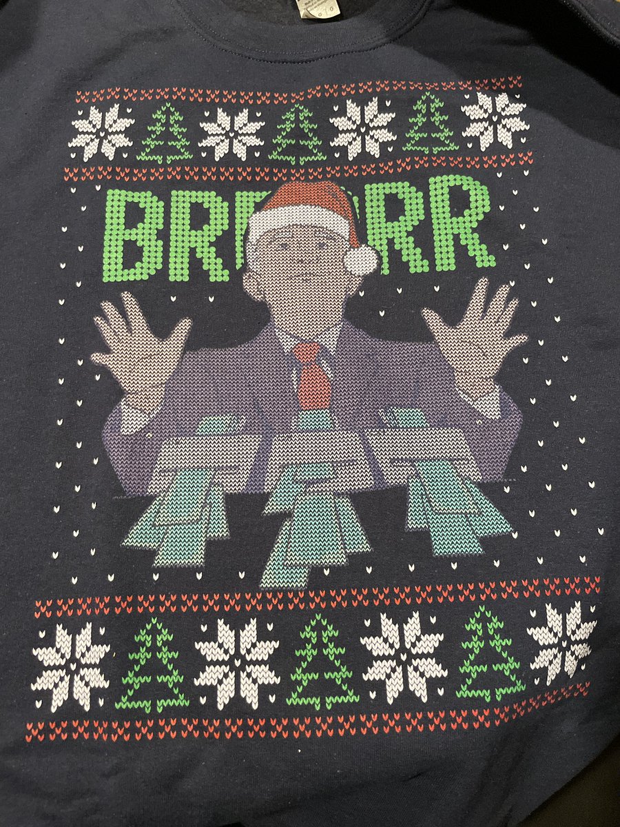 twizzler_time's tweet photo. Buffett the Bull needed inspiration during his term as the Fed Chair from the role model himself. Great sweater in time for the holidays! @wallstmemes https://t.co/FNtAEhDTQP