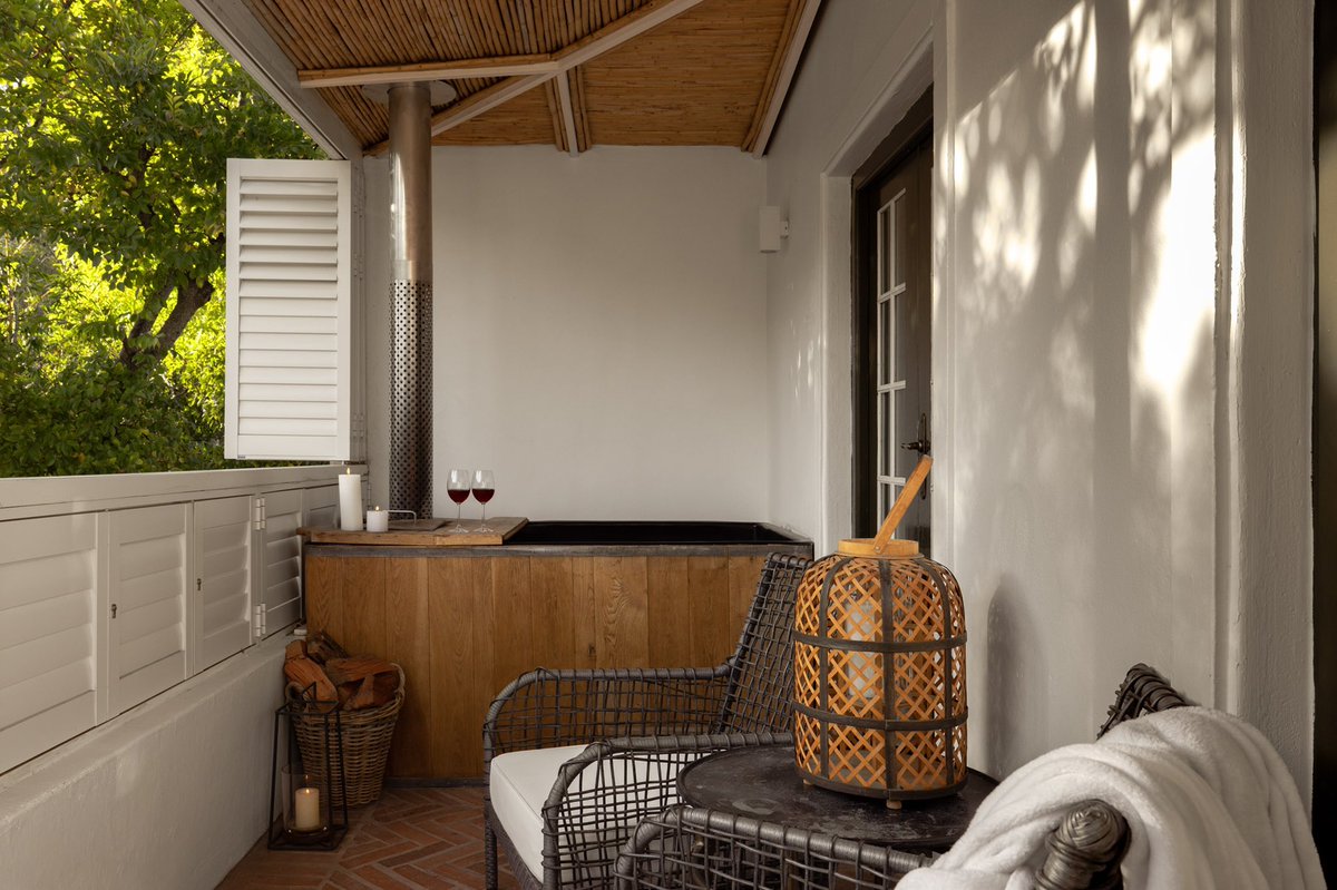 Morning light in our Uitsig suite ✨ This love nest is located one floor up and offers guests their very own private balcony with a wood-fired hot tub and mountain views. 

Book now: aka.co.za