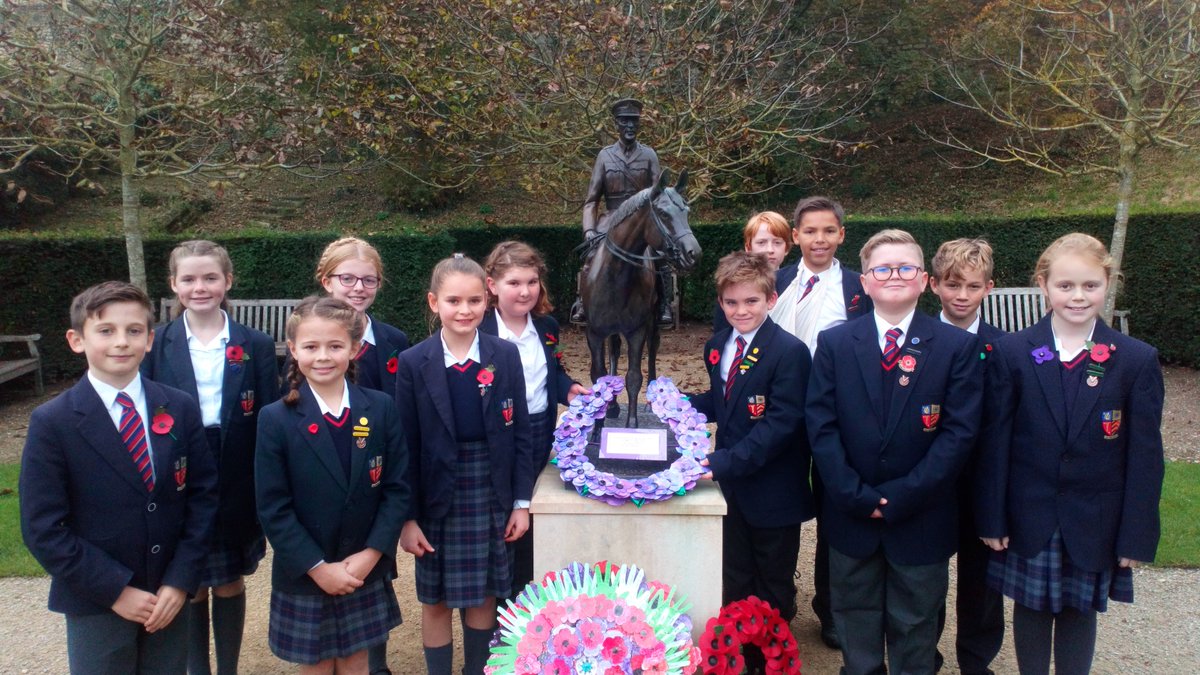 RydeSchool's tweet photo. Y6 got the honour of laying a purple wreath they had created (in honour of fallen animals) during the Field of Remembrance Service at Carisbrooke Castle last week. They were proud to be a part this solemn but important service. #lestweforget #Remembranceday #rydeprep https://t.co/jngXgKPmnb