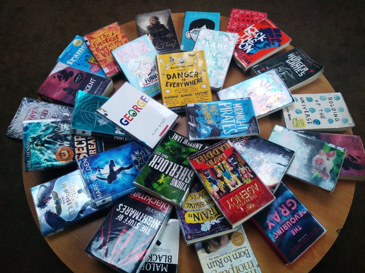 HollingworthLRC's tweet photo. An early morning #booksplosion - a fab range of genres and authors returned to us today! 📚

Starring @malorieblackman @mkhanauthor @petergbell @cat_clarke and more🌟

#greatschoollibraries #readingforpleasure #bookdroplife https://t.co/IZIVk2nNRO