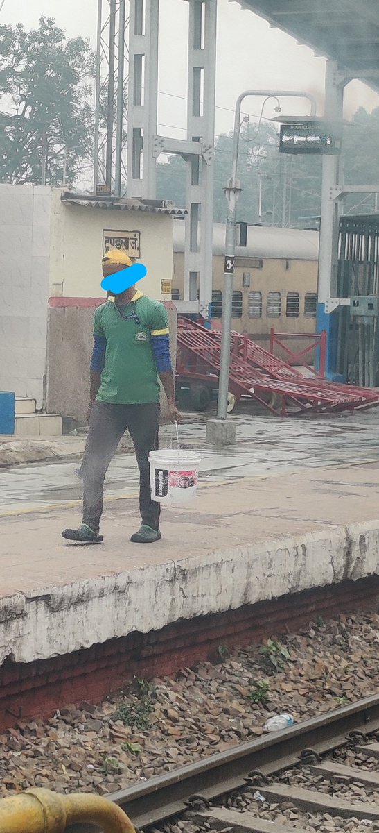 Everytime you spit on the platform, you make one fellow human being carry this bucket &amp; brush to clean it. Our team cleaning the pan stains thrice in a day on platform.