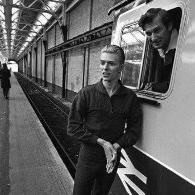charlesjholland's tweet photo. David Bowie photographed in Dover’s former Marine Station c ‘78 and obviously enjoying discussing British Rail’s rolling stock. We were presented with this photo whilst visiting the station this week with students from #studiom1 for our #changeofuse brief. @knight_david https://t.co/Y7G307Mgjf