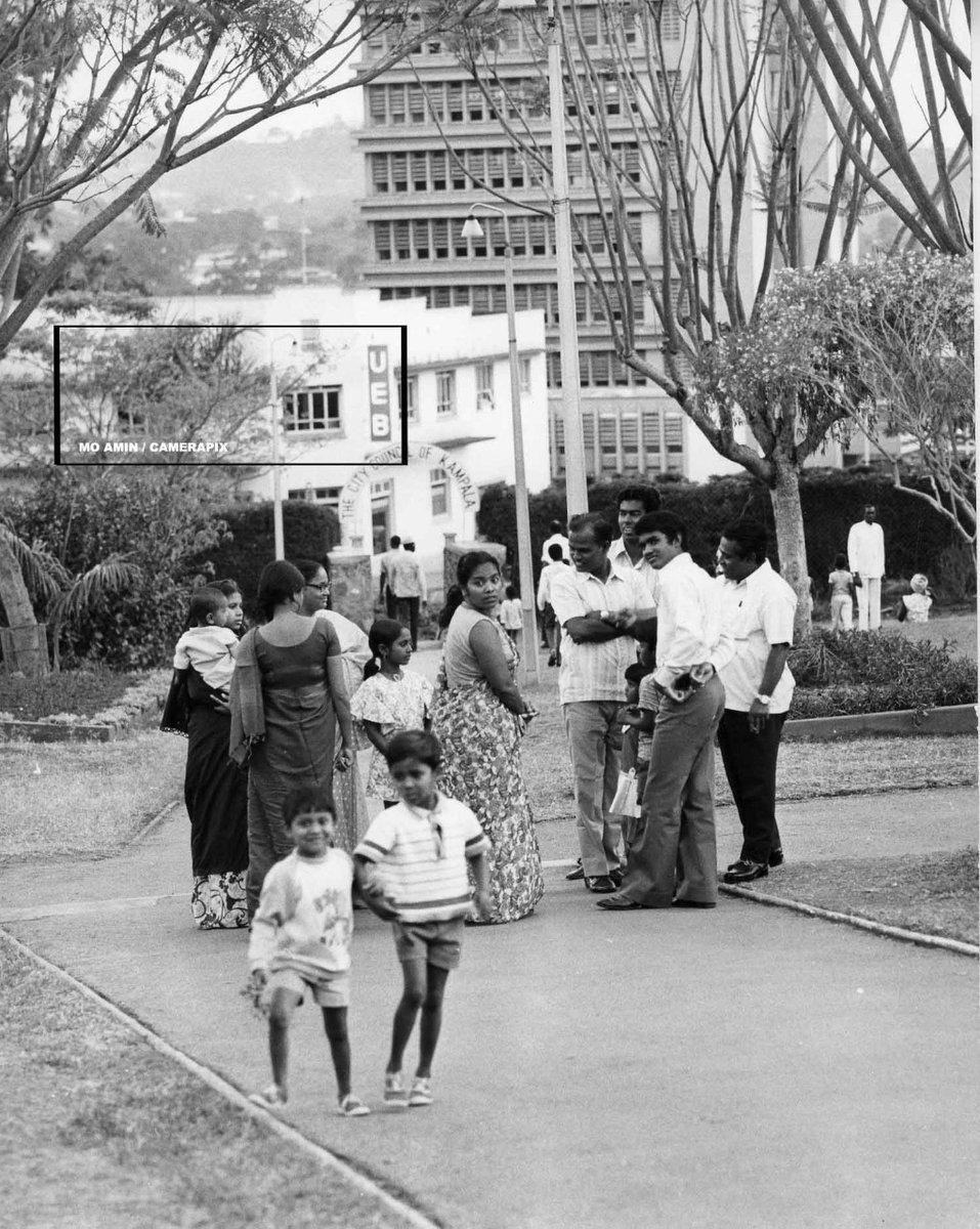 salimcamerapix's tweet photo. We continue our series on Cities in Africa and beyond, photographed through the decades by #moamin.

Asians at a park in Kampala, circa 1970.

#legend #city #cities #photography #eyeofafrica #kampala #uganda #africa #streetshot #downtown #cbd #asian 

https://t.co/8qnwdm2IIH https://t.co/QqKQu8FKj9