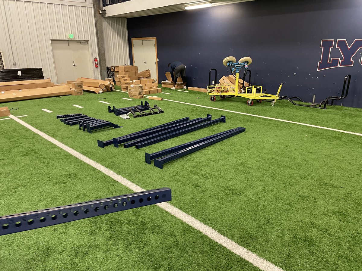 LyonScotsFB's tweet photo. New weight room coming along!! Our coaching staff working to get the facility into place!! #LyonStrong https://t.co/cKZ1anbPux