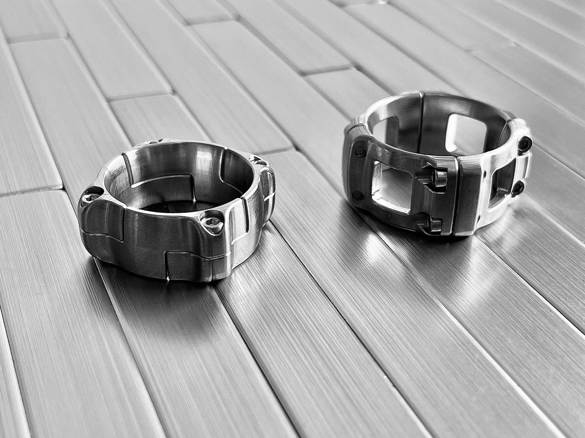 TitanRingDesign's tweet photo. QUADRO Ring on the left, SECTOR Ring on the right. Both CNC Machined ring assemblies made from Grade 5 Titanium. #cncmachining #titanium https://t.co/NHikXXIjdG