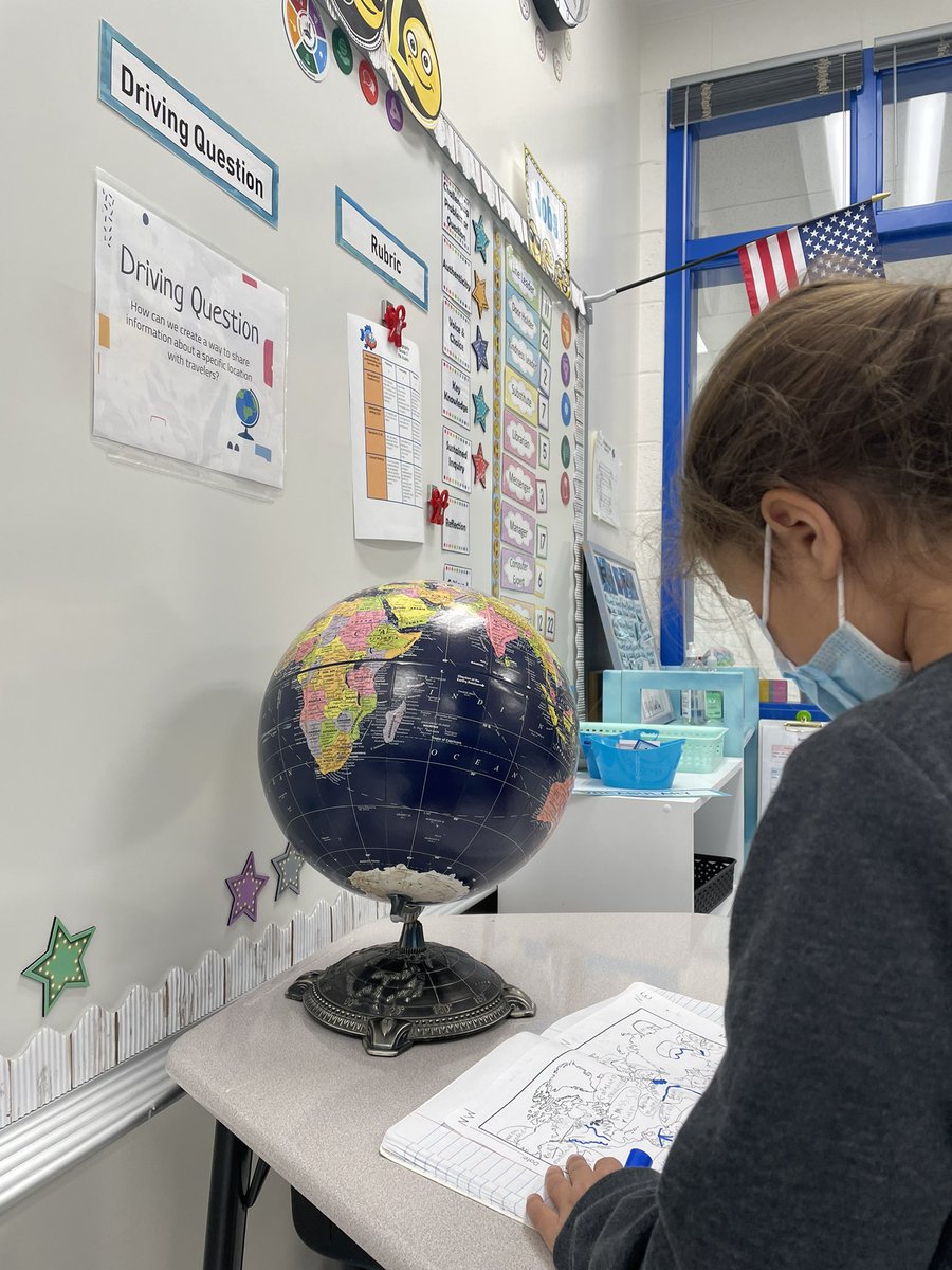 Students using the globe and the map to guide them in their PBL research on geographic features. @WaxpoolES <a href="/PBLWorks/">PBLWorks</a> <a href="/3rdThibault_WES/">Mrs.Thibault</a>