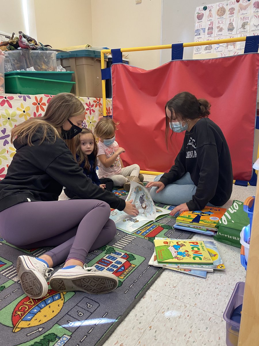 Grade 8 students spending time quality reading time with our preschool friends #wearebeverlyschools