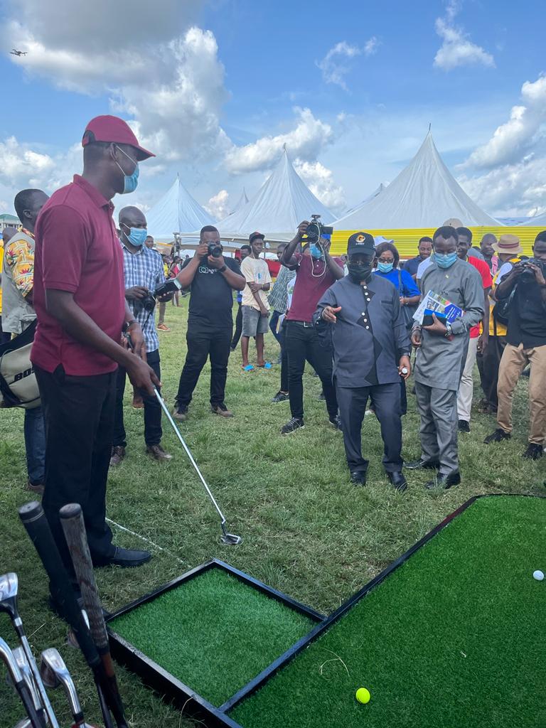 AdonaiEstateltd's tweet photo. At the official grand opening of the #VoltaFair2021 yesterday, our stand hosted some dignitaries who tried their hands on the beautiful golf game. 

#thread https://t.co/dfCDqHva2Z